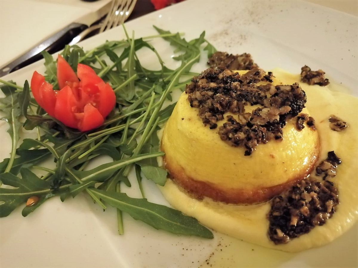 Sformato di parmigiano al tartufo del Ristorante Pizzeria Il Roscio