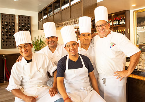 Chef Dario Furlati con la brigata di cucina di Ca' Dario Ristorante