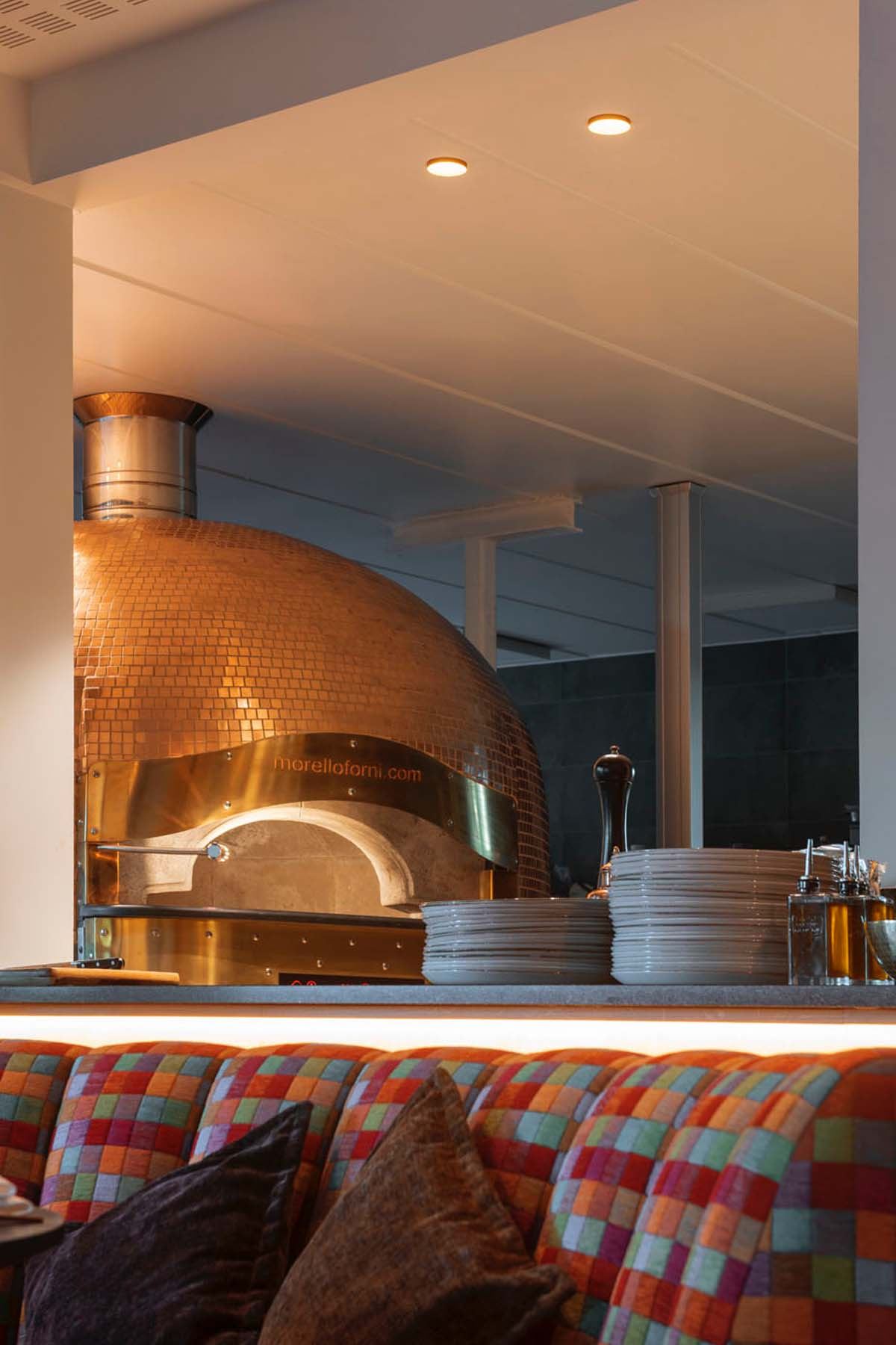 La sala da pranzo de Il Divino Di Milano con atmosfera elegante e intima