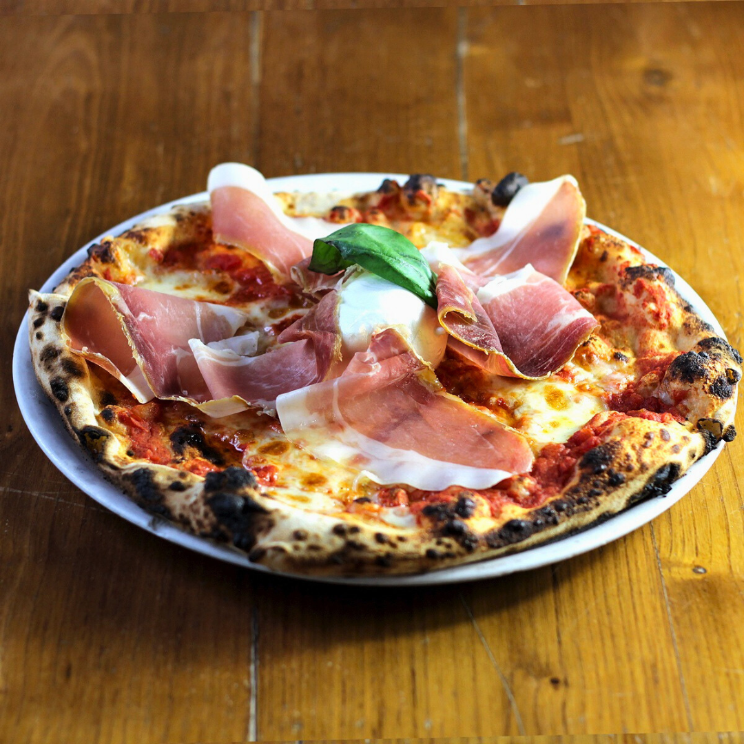 Pizza cotta al forno a legna dell'Osteria Sammartinese Da Saverio