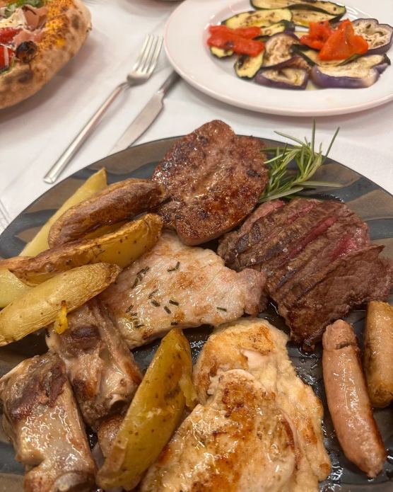 Specialità della casa al Vulcano Milano Braceria con Pizza
