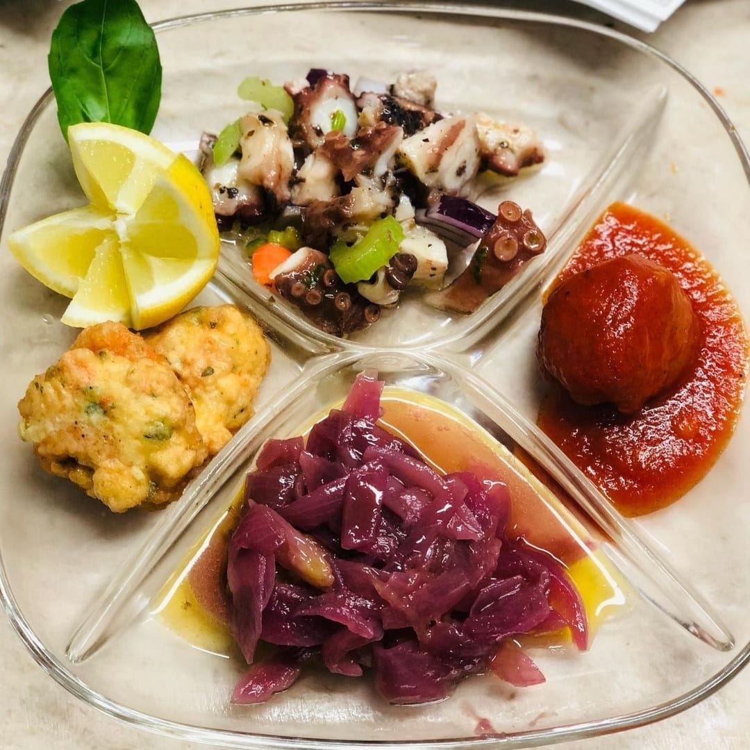 Piatti di pesce della Trattoria Da Papù a Favignana